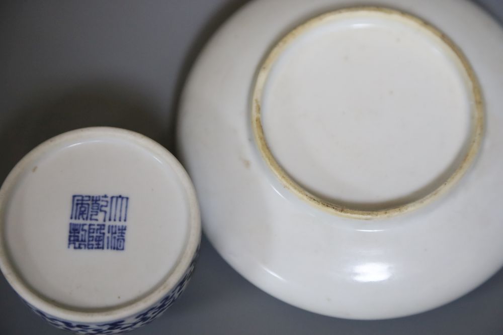 A Chinese porcelain brush holder, diameter 7cm and a Chinese enamelled shallow bowl, paintwork signed, 14cm